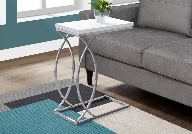 White C-shaped accent table with square top and chrome-style metal X base.