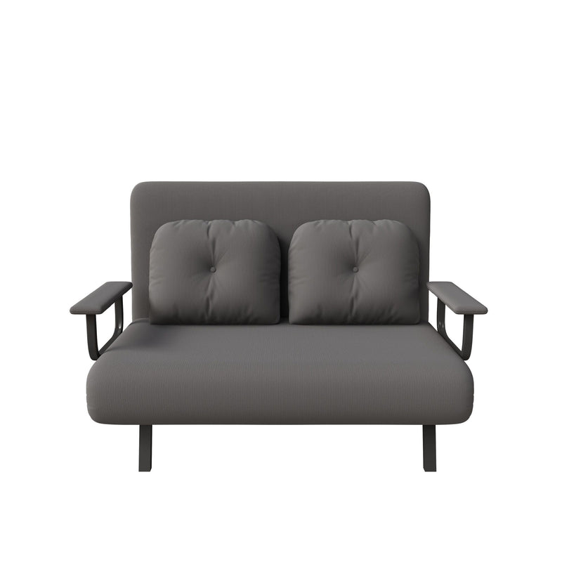 Convertible sofa bed, dark gray fabric with tufted backrest and dark arm supports.