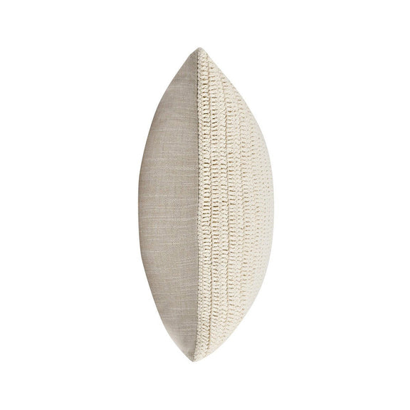 Two-sided knit throw pillow in light beige with visible seam and edge finish