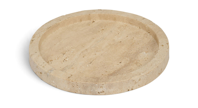 Beige travertine round tray with a shallow bowl and lightly speckled top.