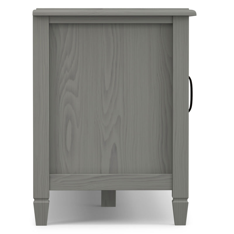 Gray TV stand side panel with tapered legs and recessed door panel