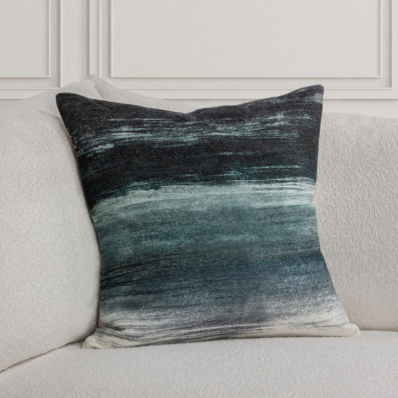 Blue multi square throw pillow with teal and charcoal horizontal abstract pattern