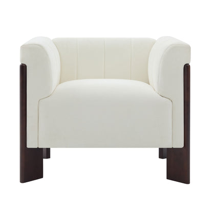 Beige accent chair with tight back, rounded arms, and dark wooden legs