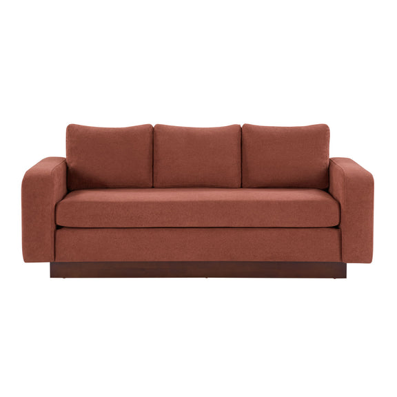 Rust red 3-seater sofa with three back cushions and cushioned seat