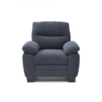 Blue upholstered accent chair with padded arms and rounded headrest