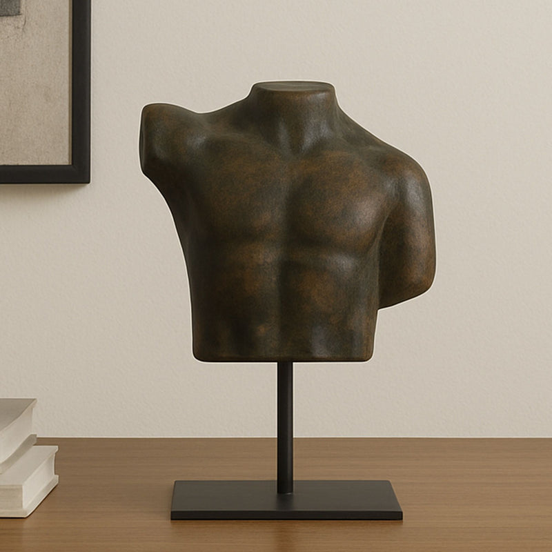 Cast aluminum torso sculpture with dark brown-green patina finish on black base.