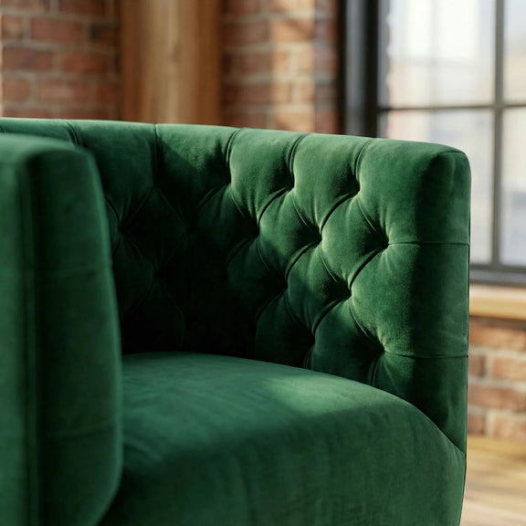 Delaney swivel chair close-up, dark green velvet tufted back and armrest padding