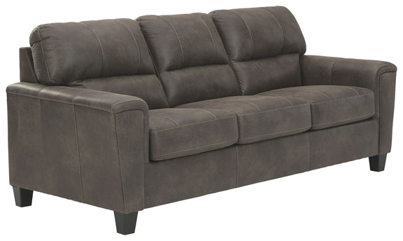 Smoke gray queen sofa sleeper angled view with tufted back and padded arms