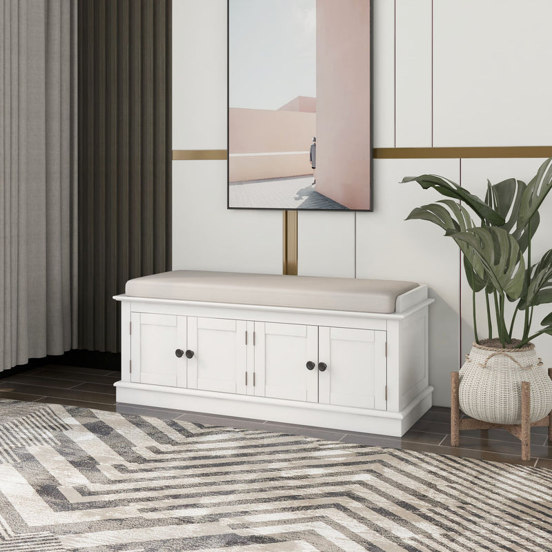 White shoe bench with a light cushion and four storage doors