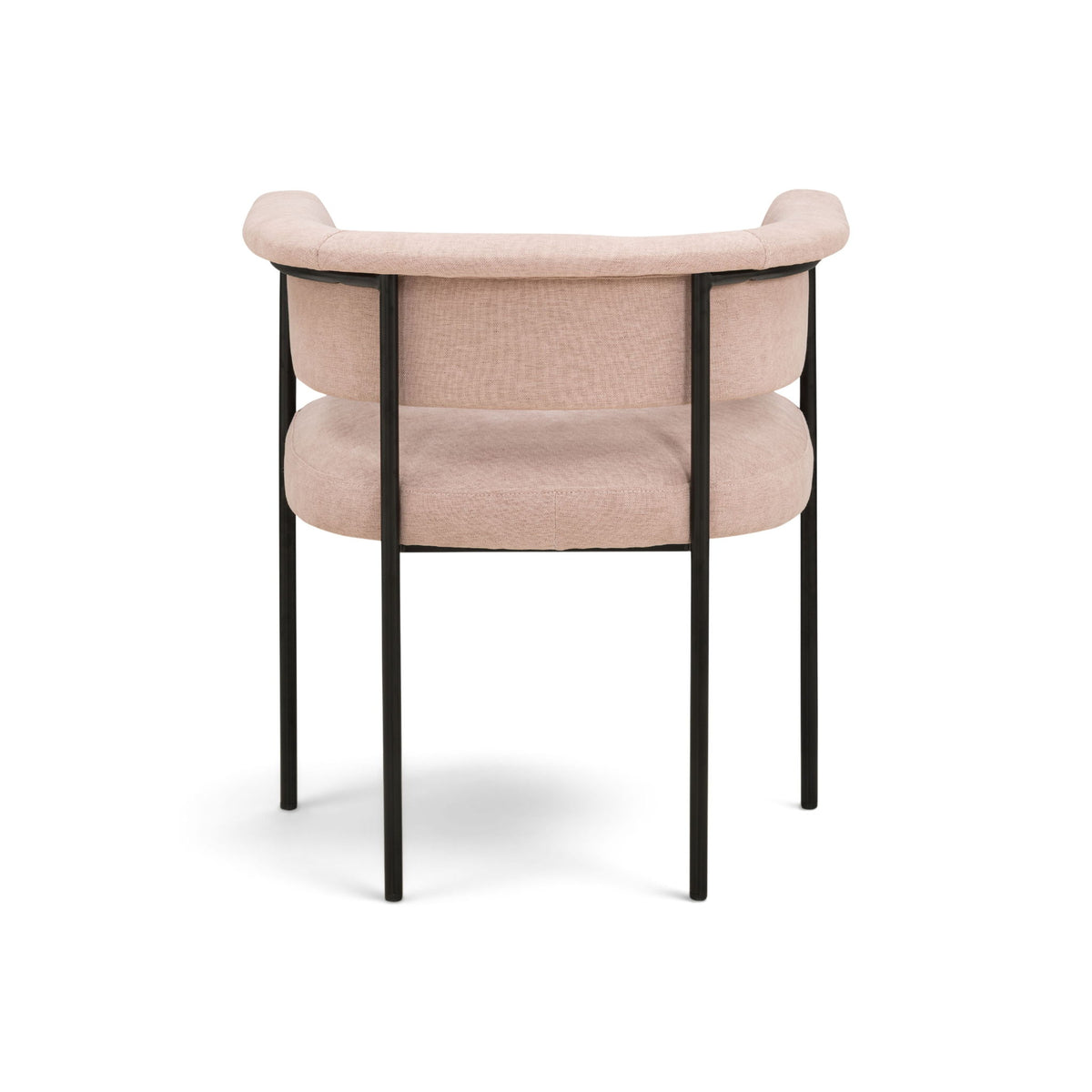Light pink upholstered dining chair with curved back, padded armrests, and black frame