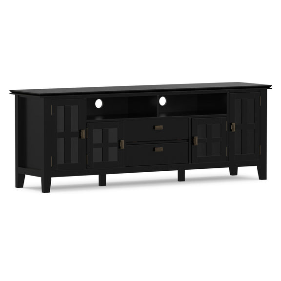 Black TV media stand with enclosed doors, open shelves, and central drawer