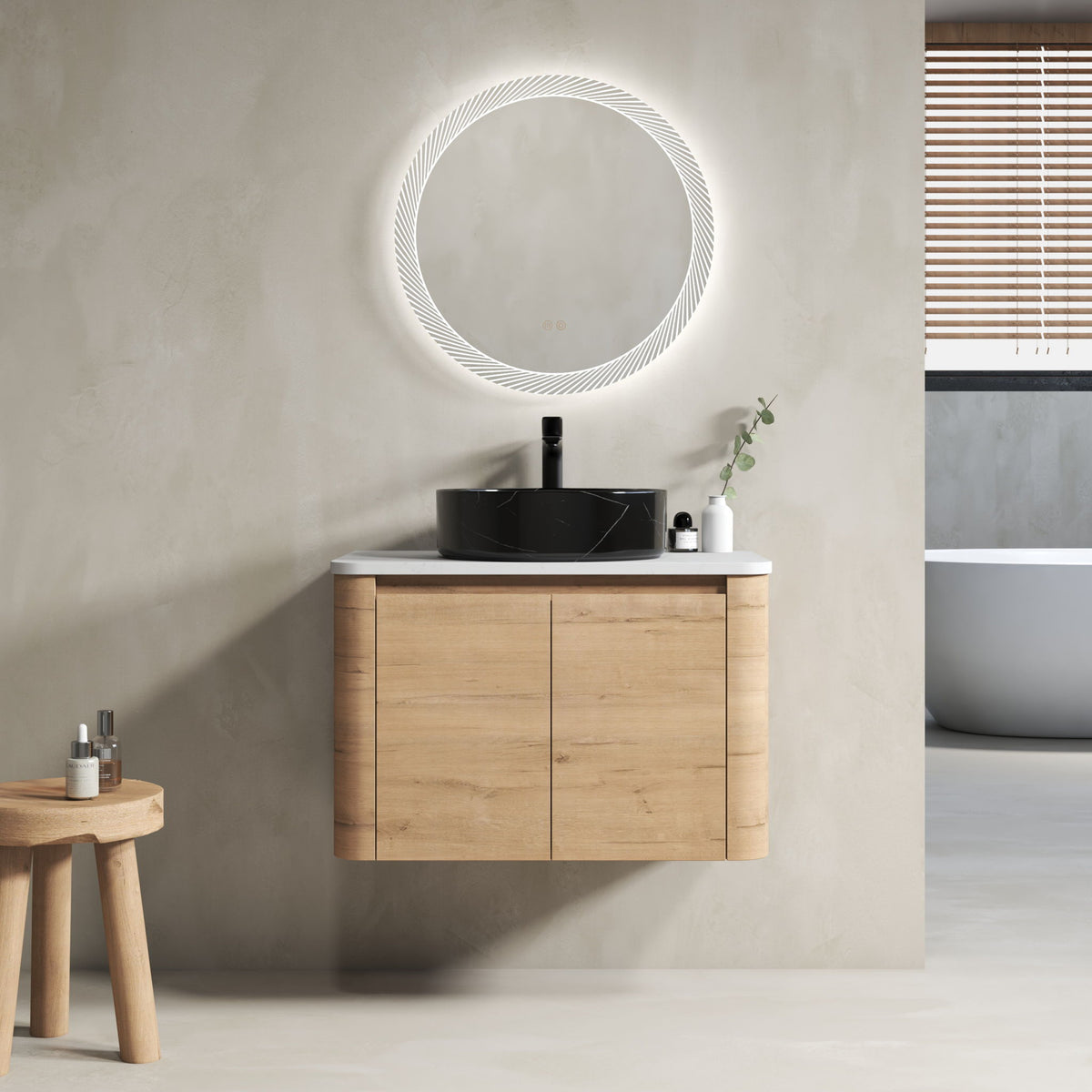 Wall-mounted bathroom vanity with light-wood cabinet and black art sink, round mirror