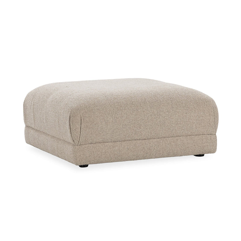 Buttermilk upholstered square ottoman with rounded top and black feet, side profile