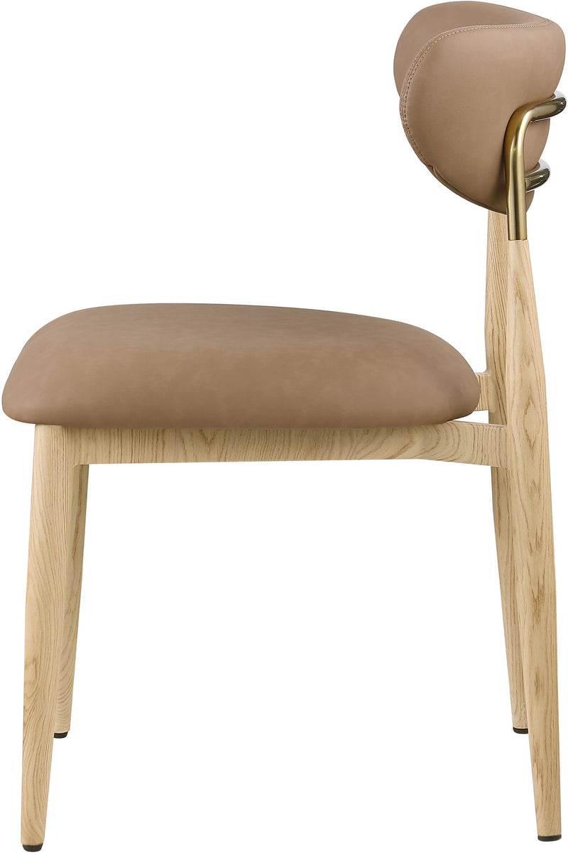 Vegan leather dining side chair with tan cushioned seat and light wood legs