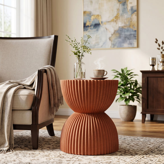 Orange speckled ribbed side table with hourglass bowl shape