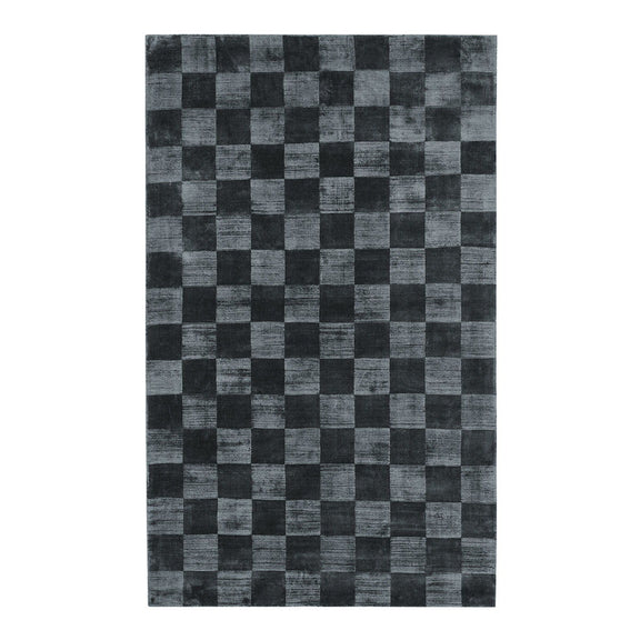 Black and gray checkered rug with alternating square sections in a grid pattern