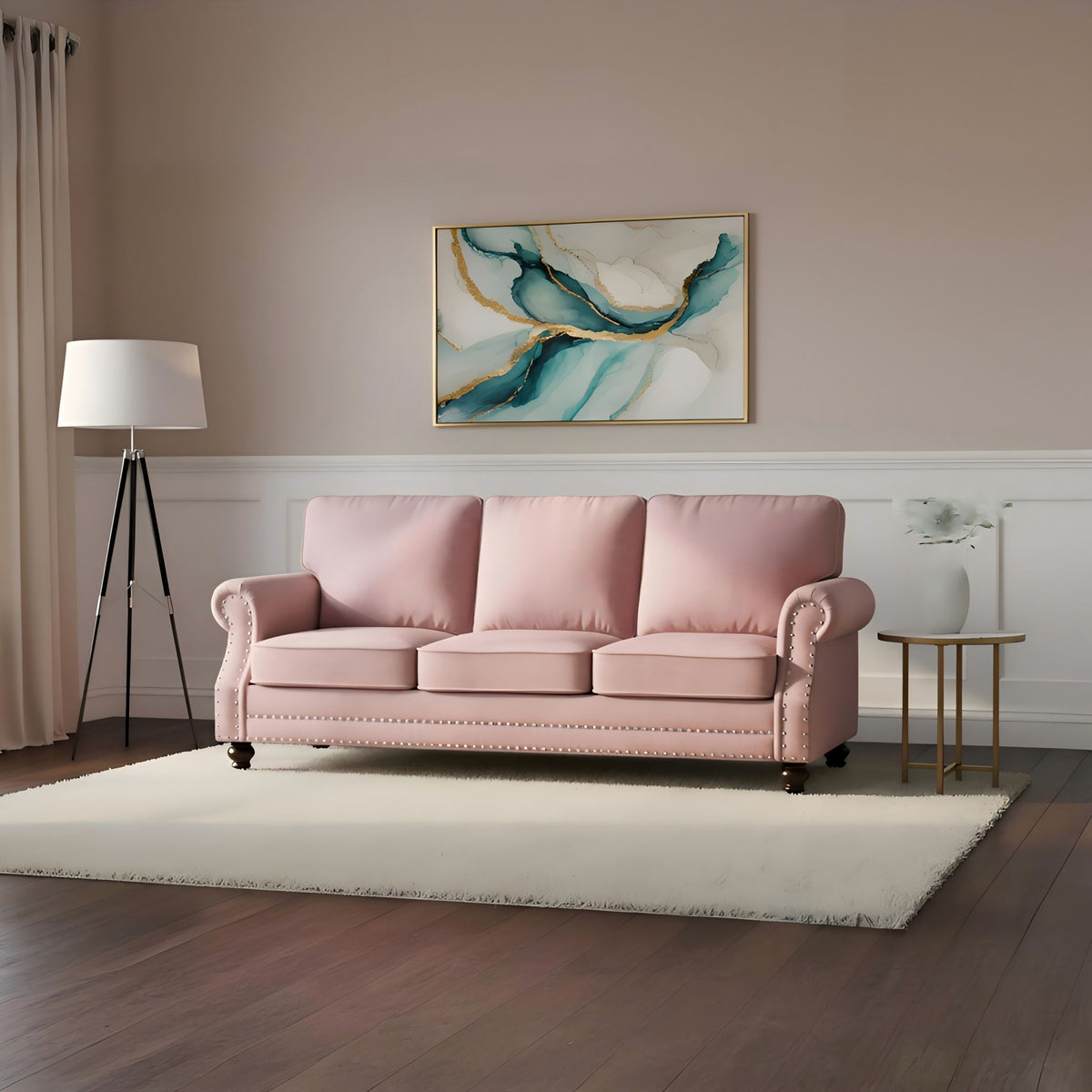 Blush pink 3-seat sofa with nailhead trim and turned legs, in living room