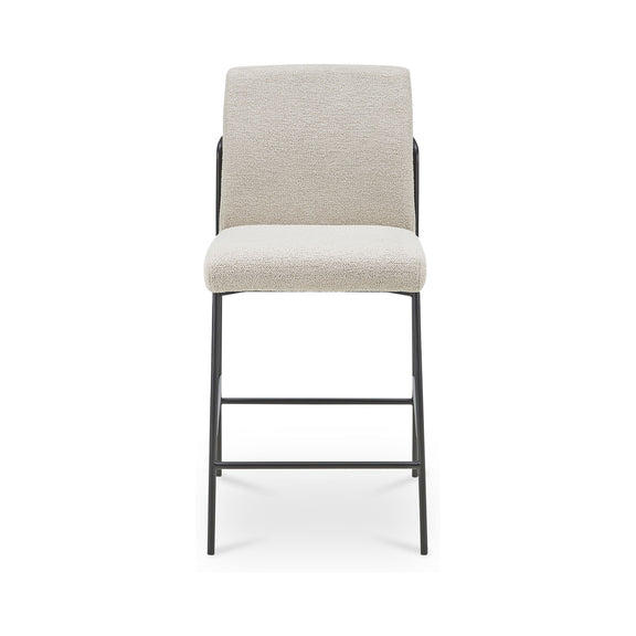 Ivory/beige upholstered counter stool, padded seat and back, black metal legs, footrest.