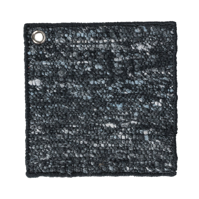 Dark charcoal area rug with light speckled pattern and metal grommet corner