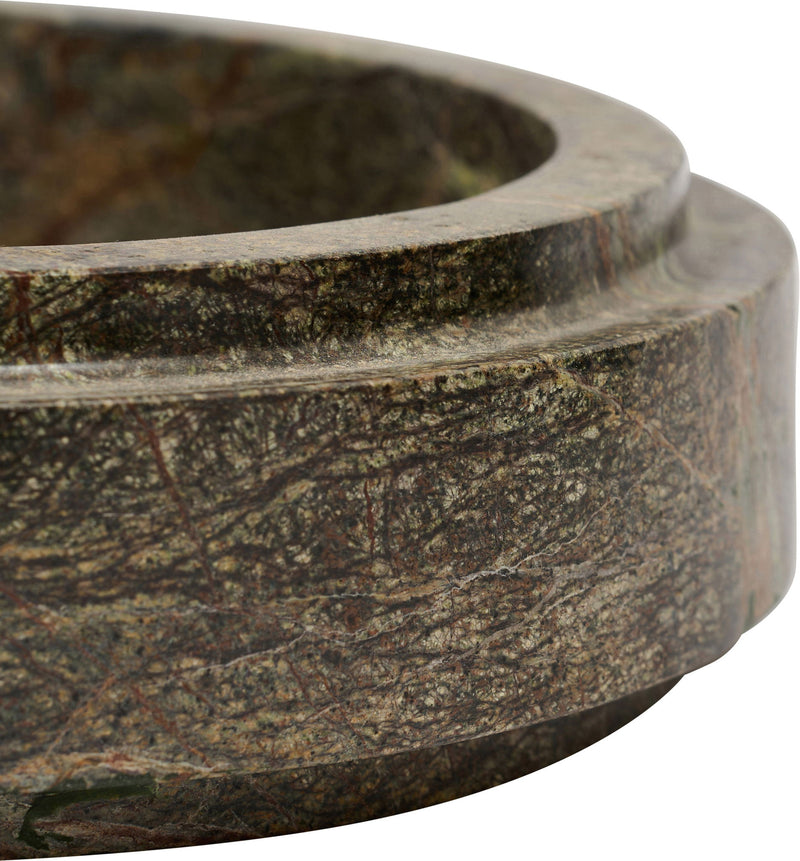 Green marble bowl side detail with rounded rim and natural veining.