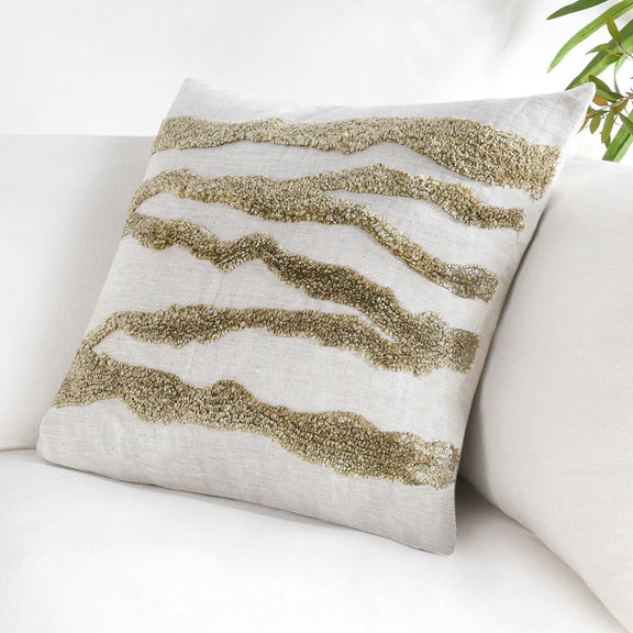 Light gray decorative pillow with olive textured wavy stripe panel, side view