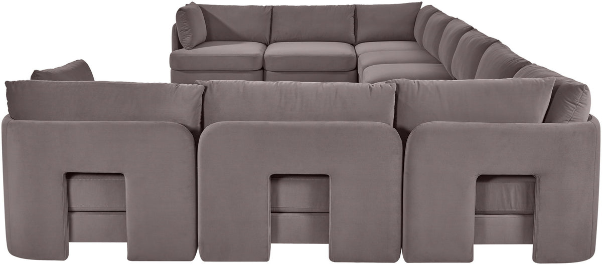 Gray velvet sectional sofa with modular corner chaise and cushioned back