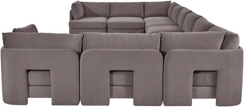 Gray velvet sectional sofa with modular corner chaise and cushioned back