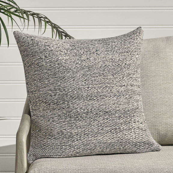 Textured woven lumbar pillow, medium gray with speckled pattern and piped edges