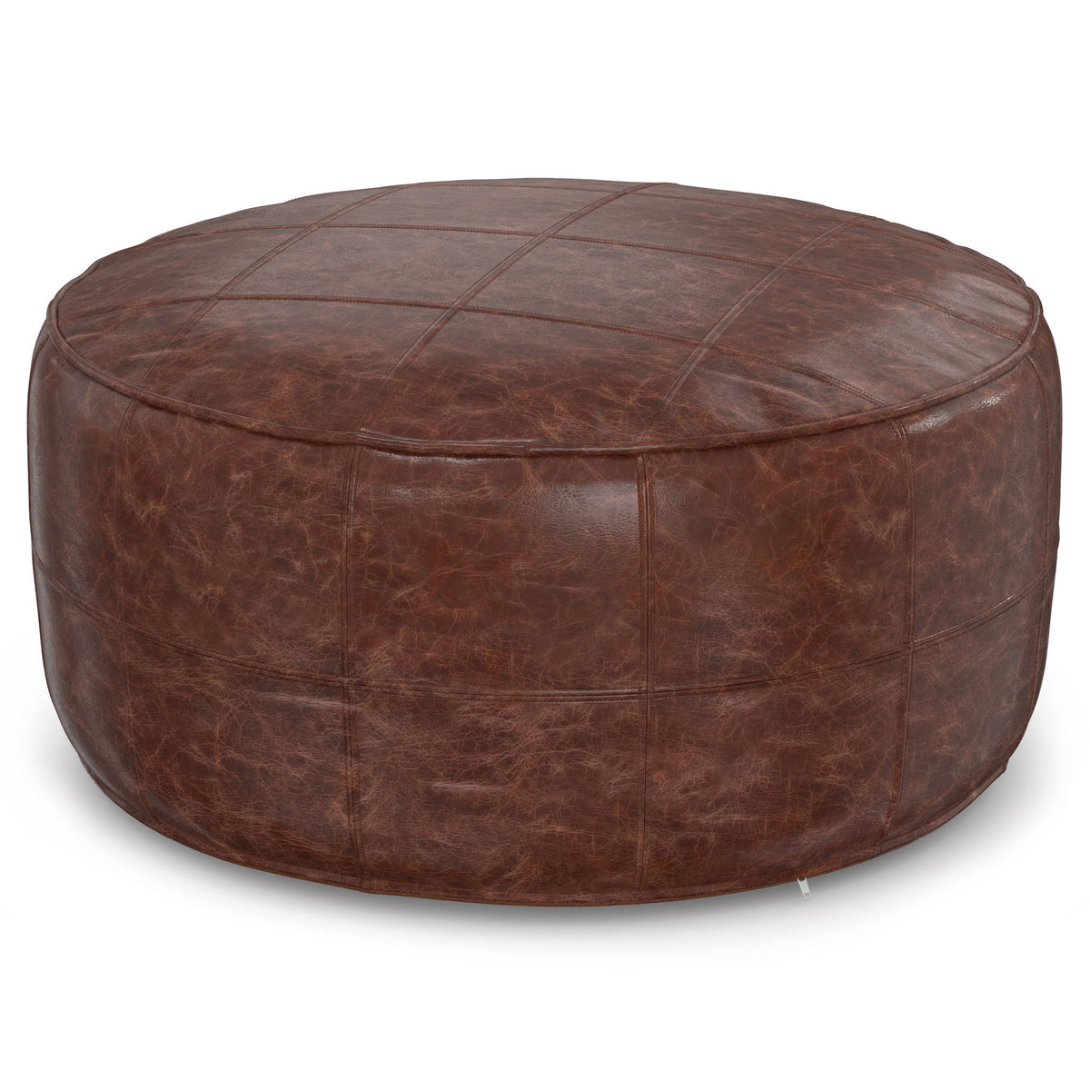 Round leather pouf in brown with stitched panel seams and domed top