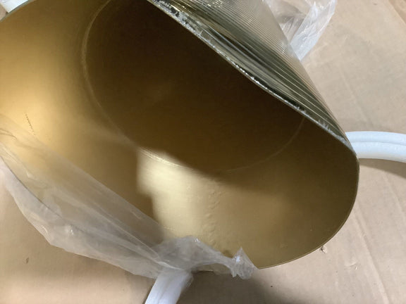 Gold-tone pedestal base underside with protective wrap on table frame