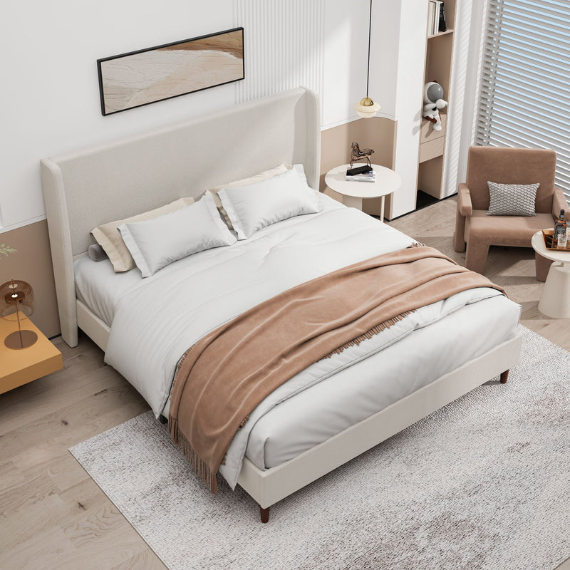 Upholstered bed with tall beige headboard and matching frame, shown from above