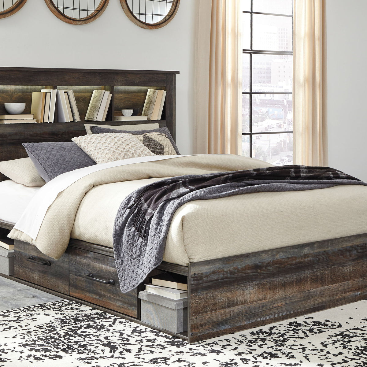 Panel bookcase bed with dark wood finish, open headboard shelving, and side storage drawers