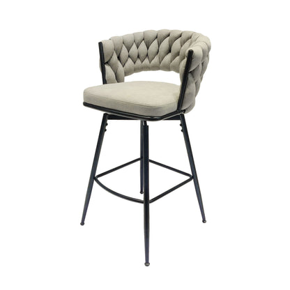 Gray bar stool with tufted back, padded seat, and black metal legs with footrest