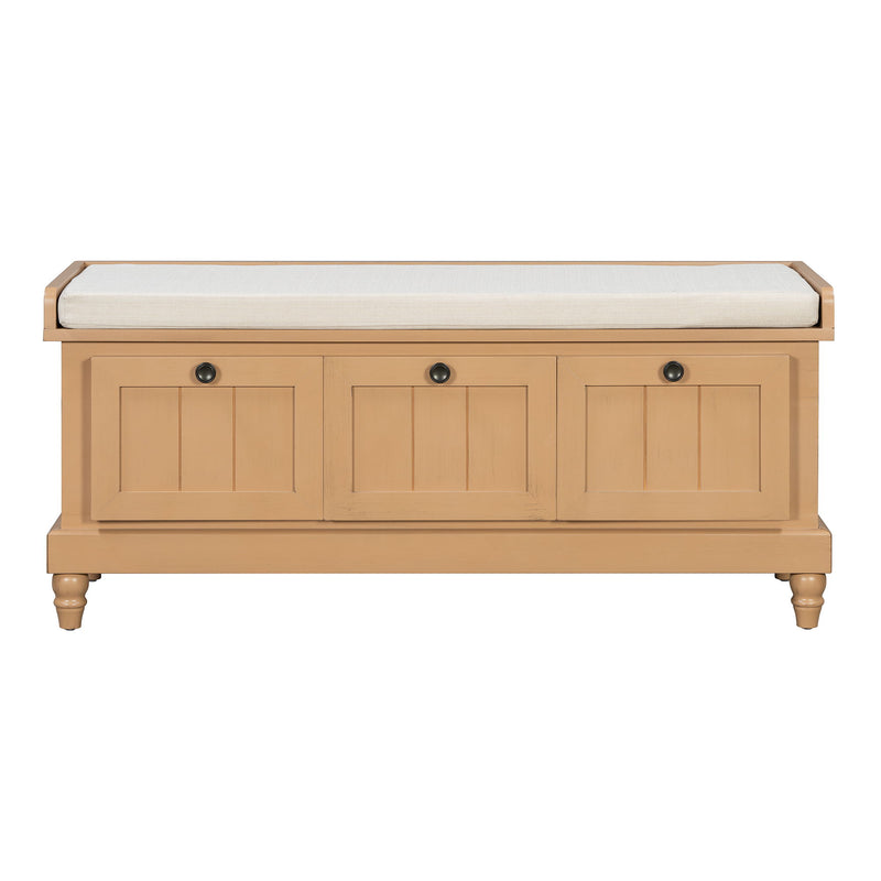 Natural wood shoe bench with padded top cushion and three drawer doors