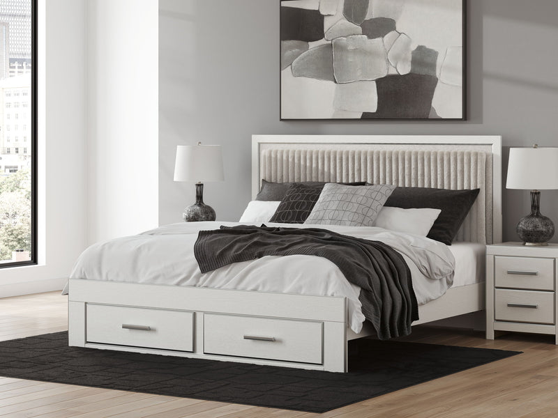White upholstered panel storage bed with slatted base and two front drawers