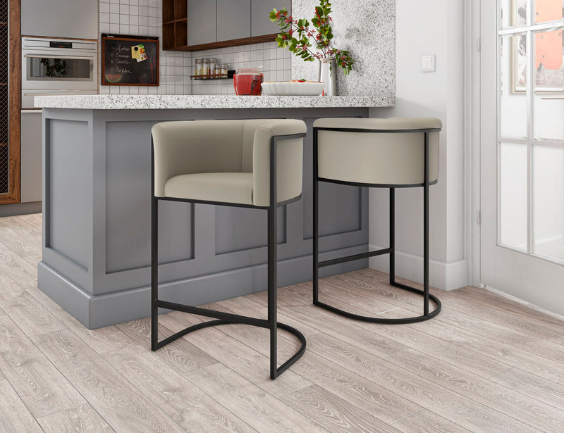 Set of two light beige upholstered counter stools with curved black base frames