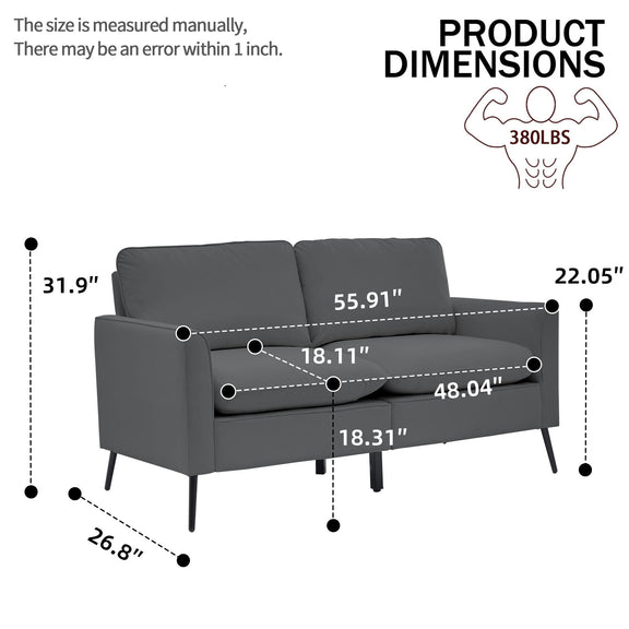 Dark gray 2-seat upholstered loveseat with tufted back, padded arms, and black legs