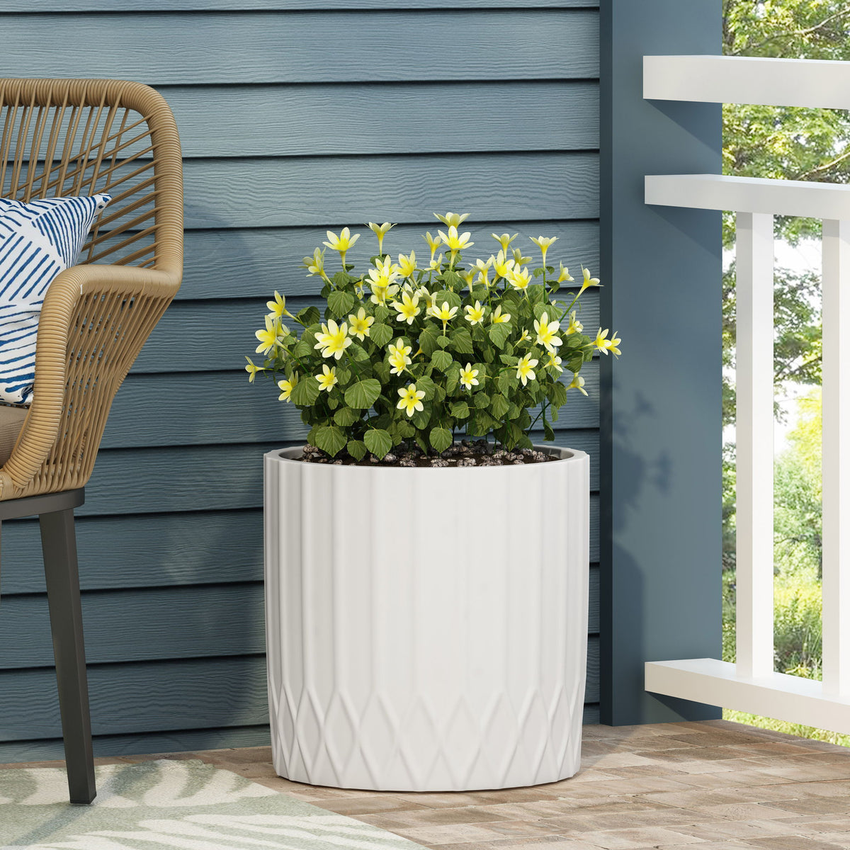 Antique white outdoor planter with diamond pleated pattern and top rim