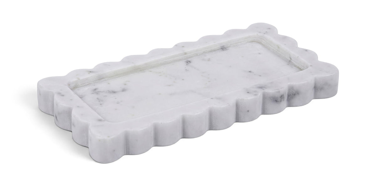 Marble tray with scalloped rim, glossy white stone with faint gray veining.