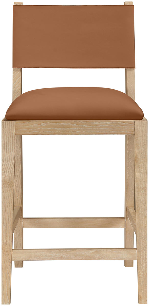 Light brown vegan leather counter stool close-up, square back and padded seat