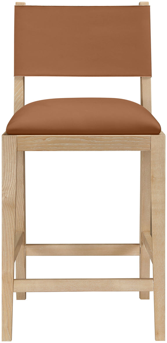 Light brown vegan leather counter stool close-up, square back and padded seat