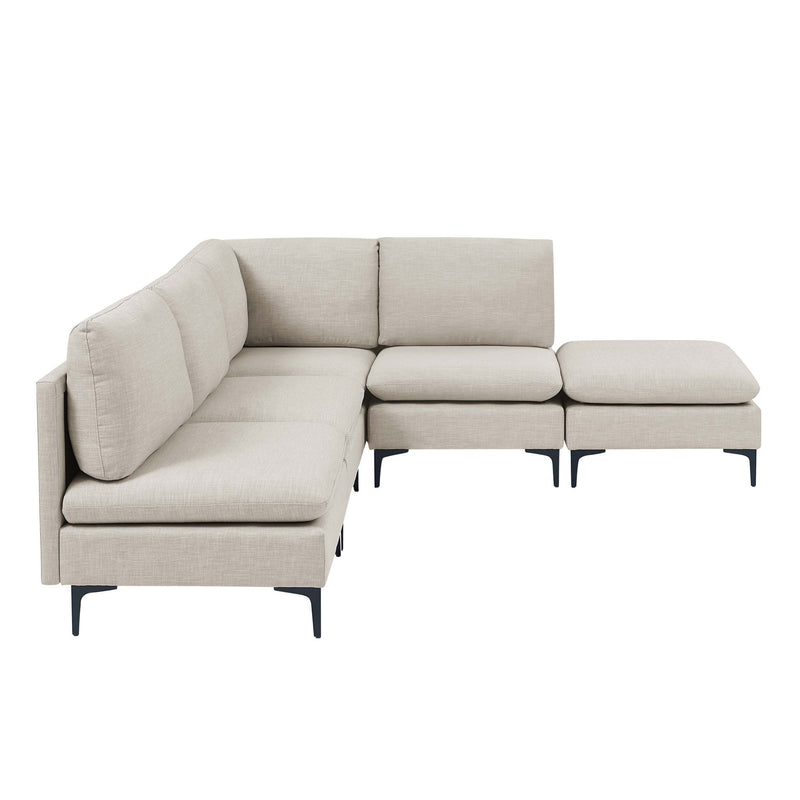 Beige modular sectional sofa with chaise ottoman seats, tall legs and rounded arm