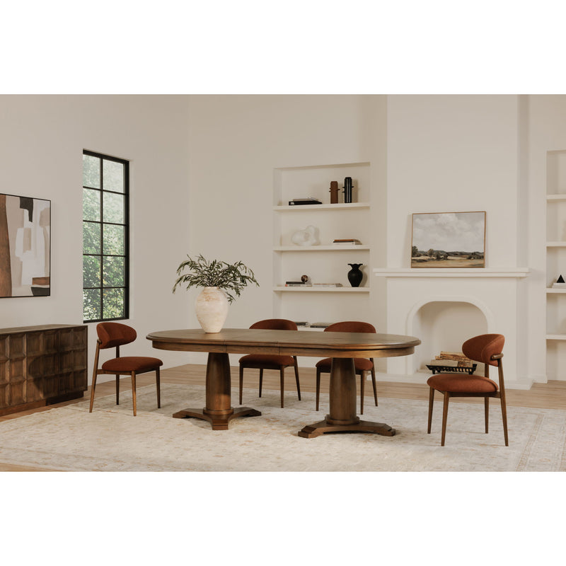 Rust upholstered dining chair with low rounded backrest, curved seat, wooden legs