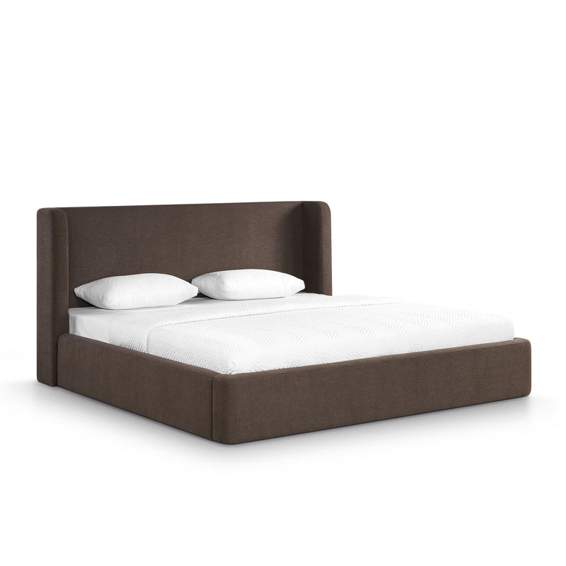 Dark brown chenille upholstered bed frame with tall headboard and white bedding