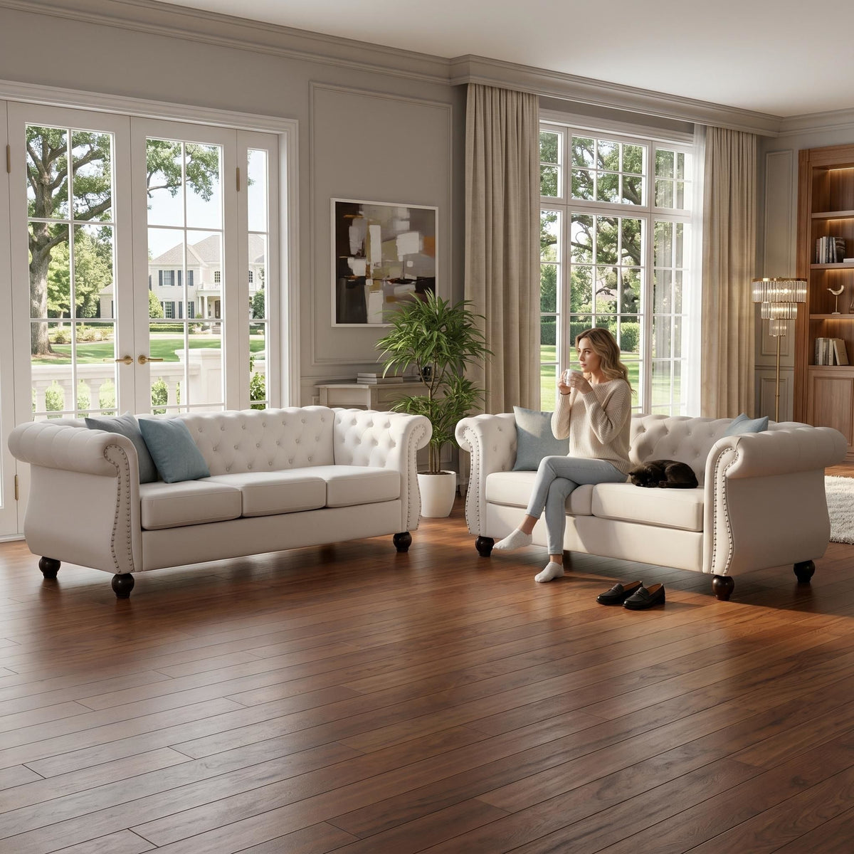 Beige three-seat button-tufted sofa with rolled arms and nail-trimmed edges