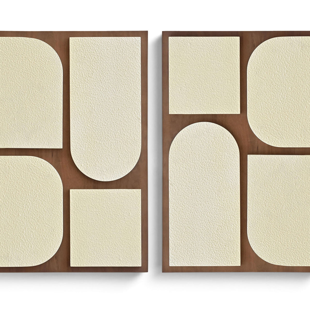 Two-piece wall art set with warm wood frames and beige abstract rounded panels.