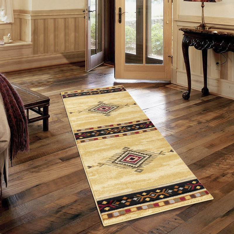 Beige area rug runner with centered medallion and navy/burgundy southwestern border