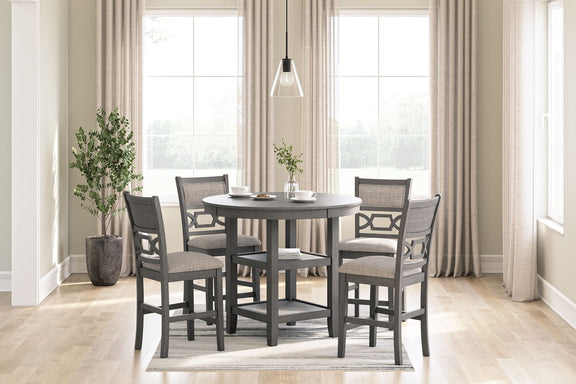 Gray counter table set with four stools in a dining room setting