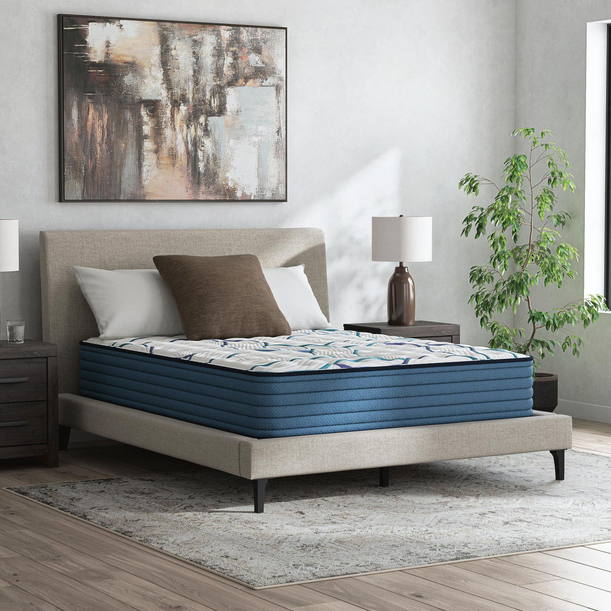 Firm 3.0 mattress on bed frame, white top with blue wave pattern and teal sides
