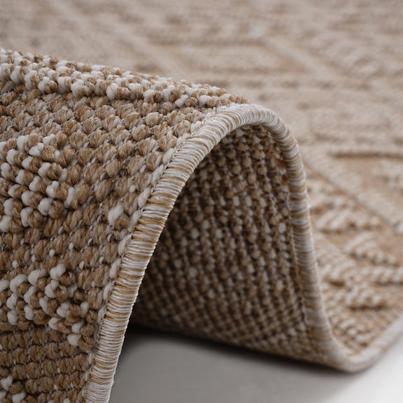 Guros traditional indoor/outdoor area rug, light tan and brown geometric pattern with bound edge